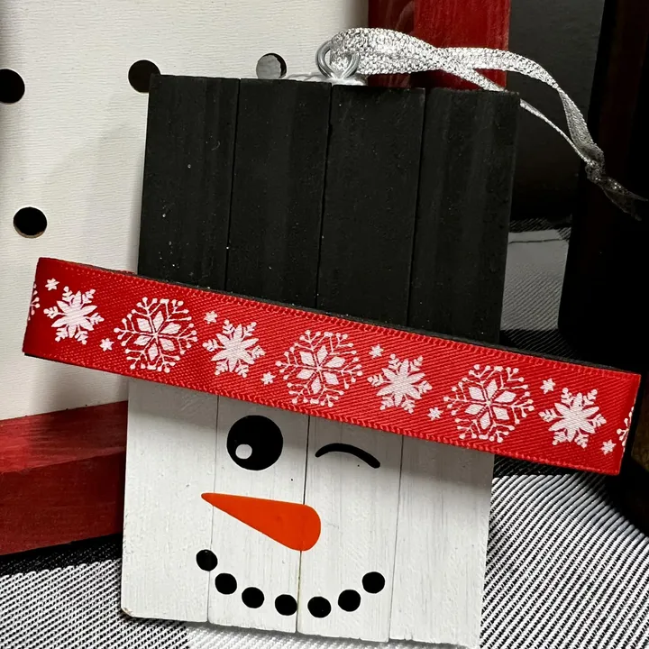 Hand-painted wooden snowman ornament