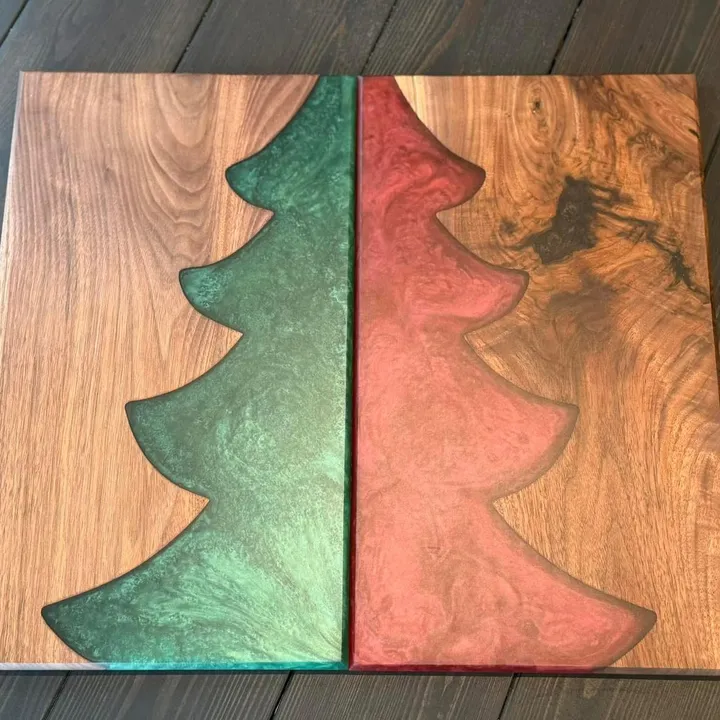 Wooden cutting boards with green and red resin Christmas trees
